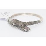 A silver and marcasite snake bangle Modern