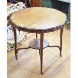 An Edwardian inlaid mahogany two tier occasional table, 76 cm diameter