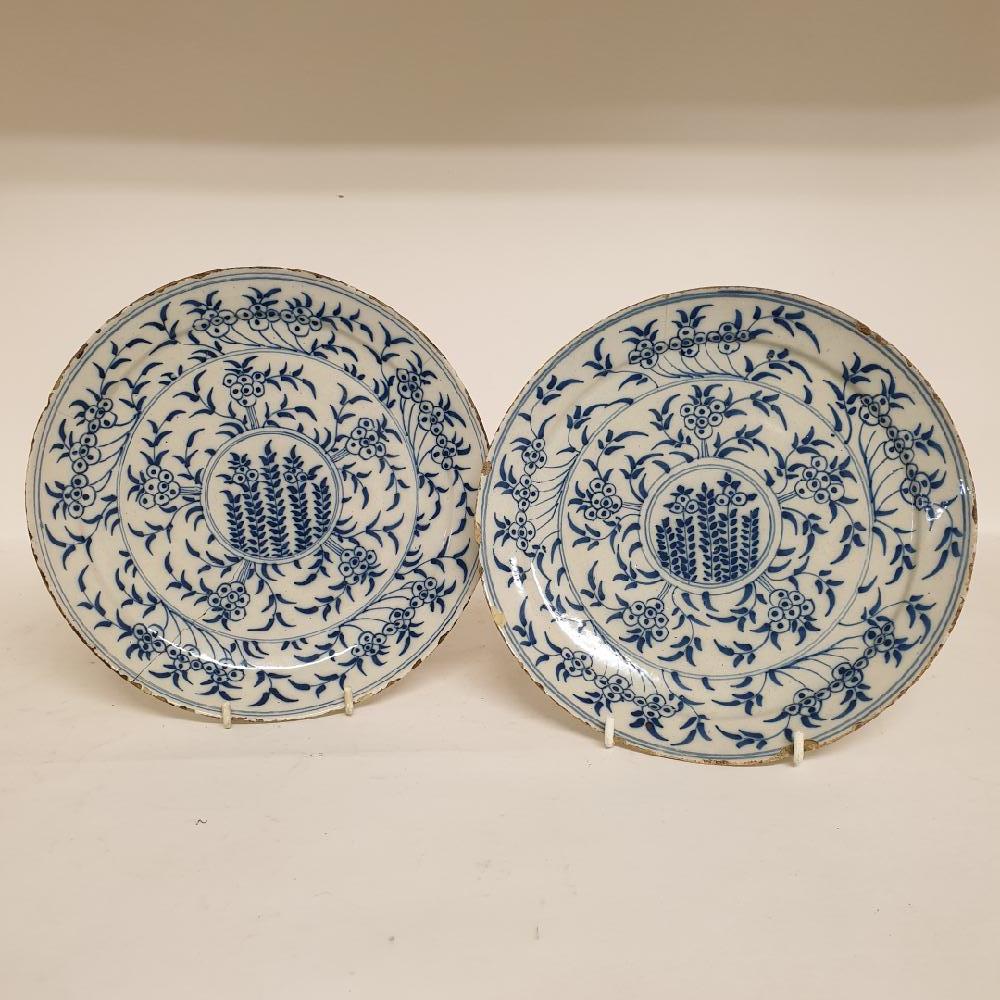 A Dutch delft polychrome plate, decorated flowers, 35 cm diameter, three other chargers, and six - Image 3 of 3