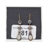 A pair of cabochon, moonstone and diamond drop earrings