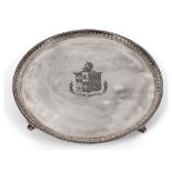 A fine late 18th century silver salver, the centre engraved a crest, coat of arms and a motto,