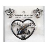 A Georg Jensen double dolphin heart shaped brooch, designed by Arno Malinowski, no. 312, with a