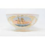 A 19th century porcelain bowl, painted a vignette of a two masted sailing ship, 28 cm diameter