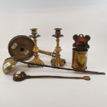 A pair of cast brass candlesticks, 21 cm high, two ladles, a chamberstick, and a candle holder (6)