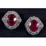 A pair of 18ct white gold, treated ruby and diamond cluster stud earrings, the rubies approx. 3.