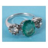 An 18ct white gold, emerald and diamond three stone ring, approx. ring size O See inside front cover