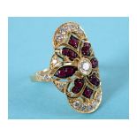 An 18ct, ruby and diamond panel ring, approx. ring O See inside front cover colour illustration