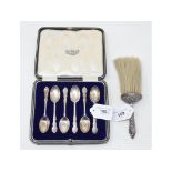 A set of six silver coffee spoons, London 1913, cased, and a silver mounted brush (2) Brush with