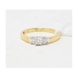 An 18ct gold and three stone diamond ring, approx. ring size L½