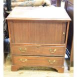 A 19th century mahogany bedside cupboard, with a tambour front above two drawers, 75 cm wide