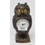 A timepiece, with Arabic numerals, in an owl case, 16.5 cm high Modern