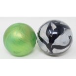 A R Ditchfield Glasform iridescent glass paperweight, of almost spherical form with striated green