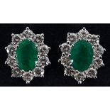 A pair of emerald and diamond cluster stud earrings See illustration