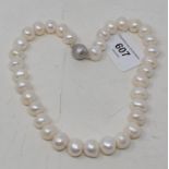 A cultured pearl necklace, with a 9ct white gold satin effect ball clasp