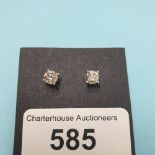 A pair of 18ct white gold and diamond stud earrings, the diamonds approx. 1.03ct Report by KB 1.03