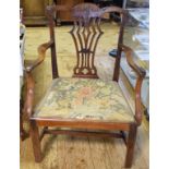 A George III mahogany carver chair, with a carved and pierced vase shaped splat, drop in