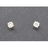 A pair of 18ct white gold and diamond stud earrings, diamonds approx. 0.58ct