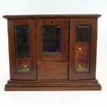 An Edwardian inlaid mahogany smokers cabinet, 37.5 cm wide