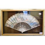 A late 19th century fan, painted a classical scene, in a glazed box frame