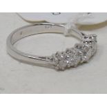 An 18ct white gold and five stone graduated diamond ring, diamonds approx. 0.75ct, approx. ring size