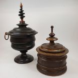 A Dutch treen tobacco jar and cover, 30 cm high, and another similar, 18 cm high Tallest one lacks a