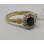 A 9ct gold, diamond and sapphire cluster ring, approx. ring size N