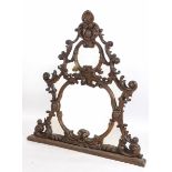 A large Continental overmantel mirror, of shaped form, carved scrolling acanthus leaves, 176 cm wide