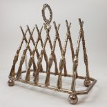 A novelty plated rifle toast rack Modern