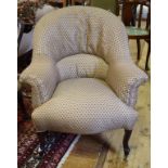 A late 19th century button back armchair, on cabriole front legs