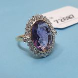 A 9ct gold, amethyst and diamond cluster ring, approx. ring size Q Report by KB Amethyst measures 18