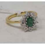 A 9ct gold, emerald and diamond cluster ring, approx. ring size M