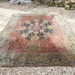 EXTRA LOT: A machine made carpet, of Eastern design, 420 x 303 cm