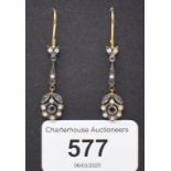 A pair of sapphire and diamond daisy style drop earrings