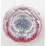 A Whitefriars Millefiore glass paperweight, with multi faceted decoration, one cane dated 1971