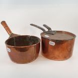 A 19th century copper saucepan and cover, engraved Stocken Hall no. 7, and another copper