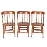 A set of six late Victorian/Edwardian pine and beech kitchen chairs, with turned spindles (6) See