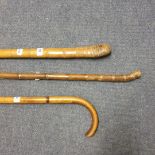 A Victorian alpine walking cane, 49 cm, and two other similar (3)