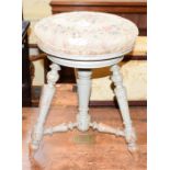 A French painted stool, the revolving top on turned supports