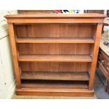 A late Victorian mahogany open bookcase, on a plinth base, 120.5 cm wide