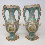 A pair of Victorian style vases, with rococo style decoration, 25.5 cm high Modern