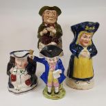 A Staffordshire pottery Town Crier character jug, 16 cm high, and three other character jugs (4)