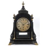 A mantel clock, the 13.5 cm diameter silvered dial signed James Duncan, Chancery Lane, London,