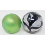 A R Ditchfield Glasform iridescent glass paperweight, of almost spherical form with striated green