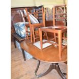 A late Victorian brass standard lamp, a two seater settee, a dining table, chairs and other