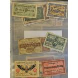 A collection of German and Austrian Notgeld and inflation money, mostly 1920's, in a file