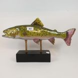 A pottery fish, on a stand, 24 cm high Modern