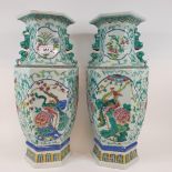 A pair of Chinese famille rose vases, of hexagonal baluster form, decorated birds, flowers and