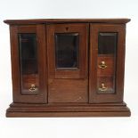 An Edwardian inlaid mahogany smokers cabinet, 37.5 cm wide