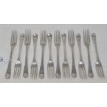 A set of twelve George III Old English pattern silver dessert forks, with bright cut decoration,