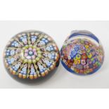 A Strathearn glass paperweight, with faceted sides and decorated with multi coloured canes, boxed,